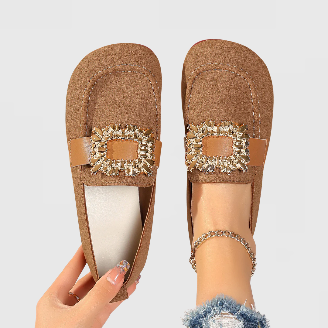 Women's orthopedic loafers by My Store with cushioned arch support, featuring brown leather uppers and slip-on style.