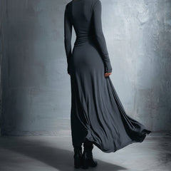 Flowy summer maxi dress for women with wrap design, lightweight fabric, and vibrant pattern, perfect for warm weather.