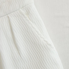 Cream textured lantern sleeve two-piece set with pants for women, stylish and comfortable fashion outfit.