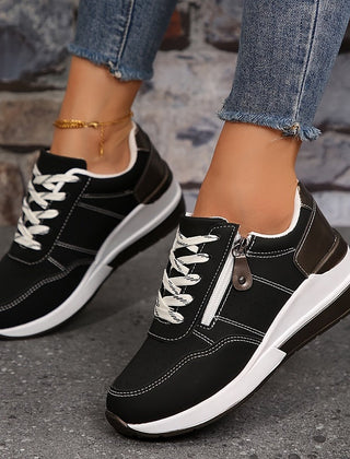 Breathable women's orthopedic sneakers with non-slip soles, designed for comfort and support, featuring a stylish casual look.