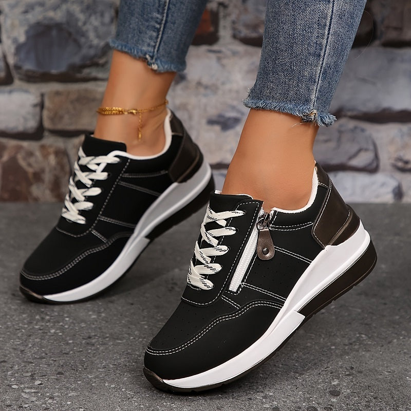 Breathable women's orthopedic sneakers with non-slip soles, designed for comfort and support, featuring a stylish casual look.