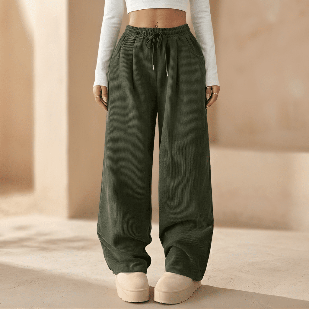 Women’s corduroy relaxed wide-leg trousers by Tammy Bradley, shown in a soft brown color, featuring a comfortable fit and high waist.