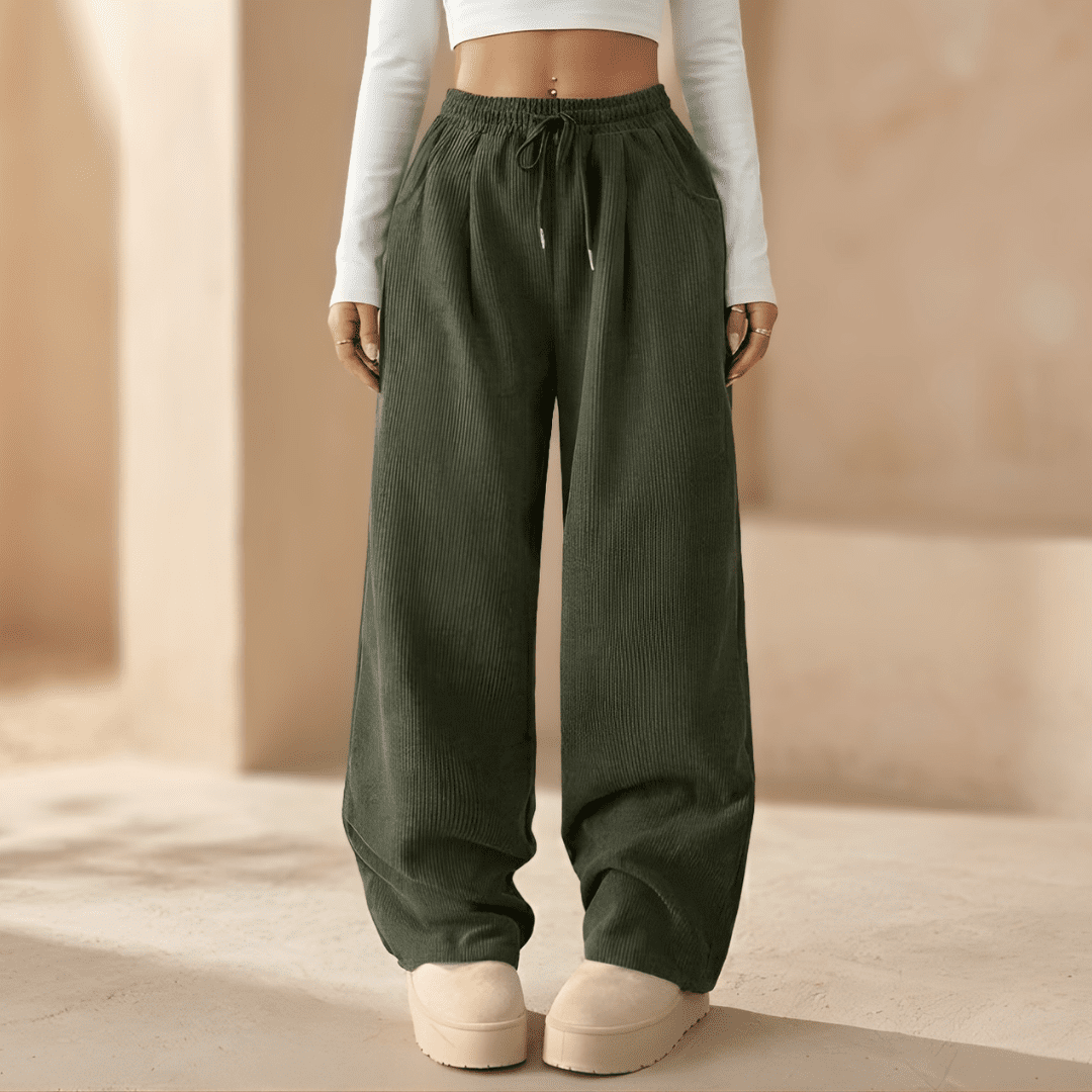 Women’s corduroy relaxed wide-leg trousers by Tammy Bradley, shown in a soft brown color, featuring a comfortable fit and high waist.