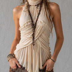 Ivory pleated halter neck chiffon sleeveless blouse for women, stylish and lightweight top with elegant pleats and halter design.