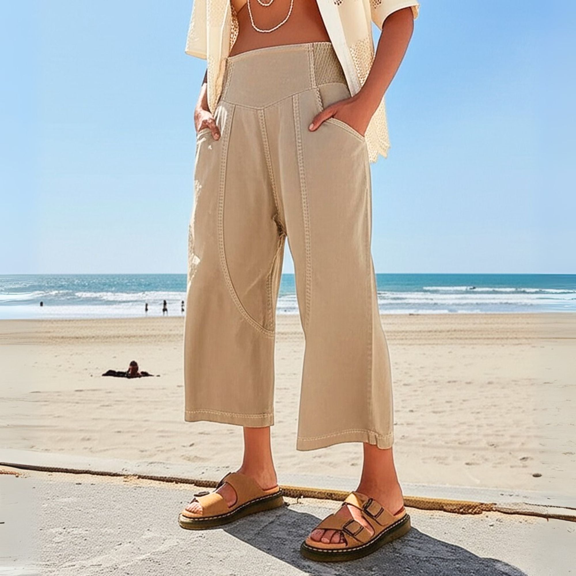 Women’s harem-cut wide leg denim trousers with a loose pull-on design, featuring a relaxed fit and stylish silhouette.