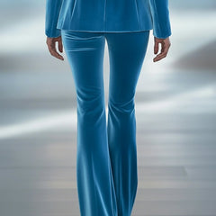 Blue loose velvet flared women's trousers featuring a relaxed fit and wide-leg style, perfect for casual or stylish looks.