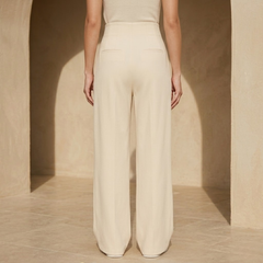 Women's high-waisted tailored wide-leg trousers in black, featuring a sleek fit and crisp pleats for a sophisticated look.
