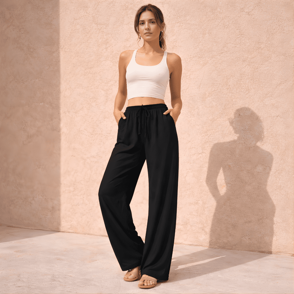 Women's wide-leg drawstring lounge trousers by Tammy Bradley, featuring soft fabric and relaxed fit with an elastic waistband.