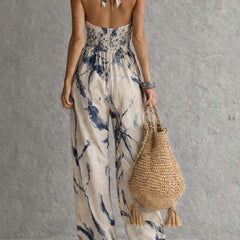 White ink wash print women's halter neck wide-leg jumpsuit with pockets, stylish and comfortable pants for women.