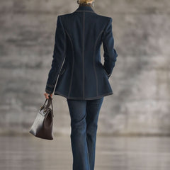 Navy topstitched denim jacket for women, stylish casual outerwear with button-front and classic fit.