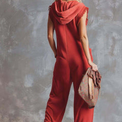Raspberry red cotton women’s hooded zip-front jumpsuit with pants style, featuring a front zipper and casual fit.