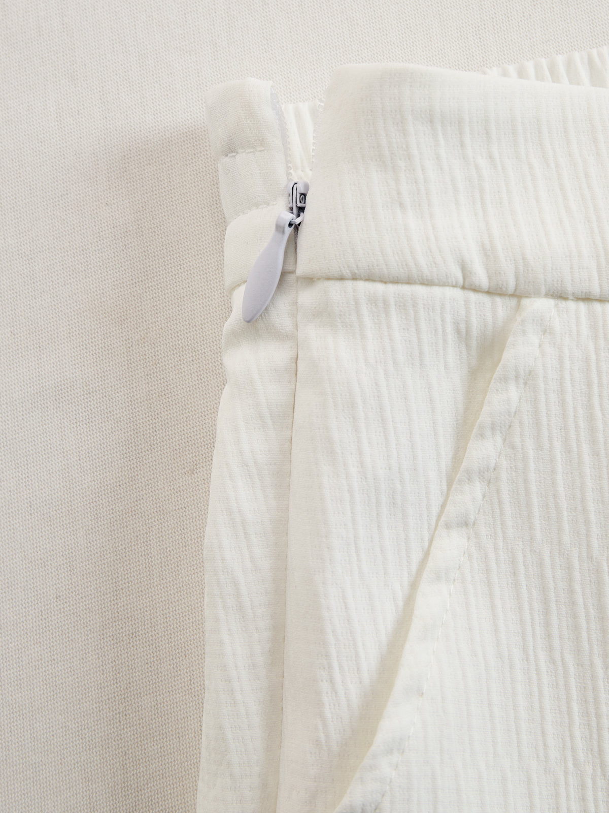 Cream textured lantern sleeve two-piece set for women featuring stylish pants, perfect for casual or dressy occasions.