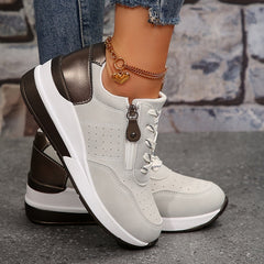 Breathable women's orthopedic sneakers with non-slip soles, featuring supportive design and casual style in neutral tones.