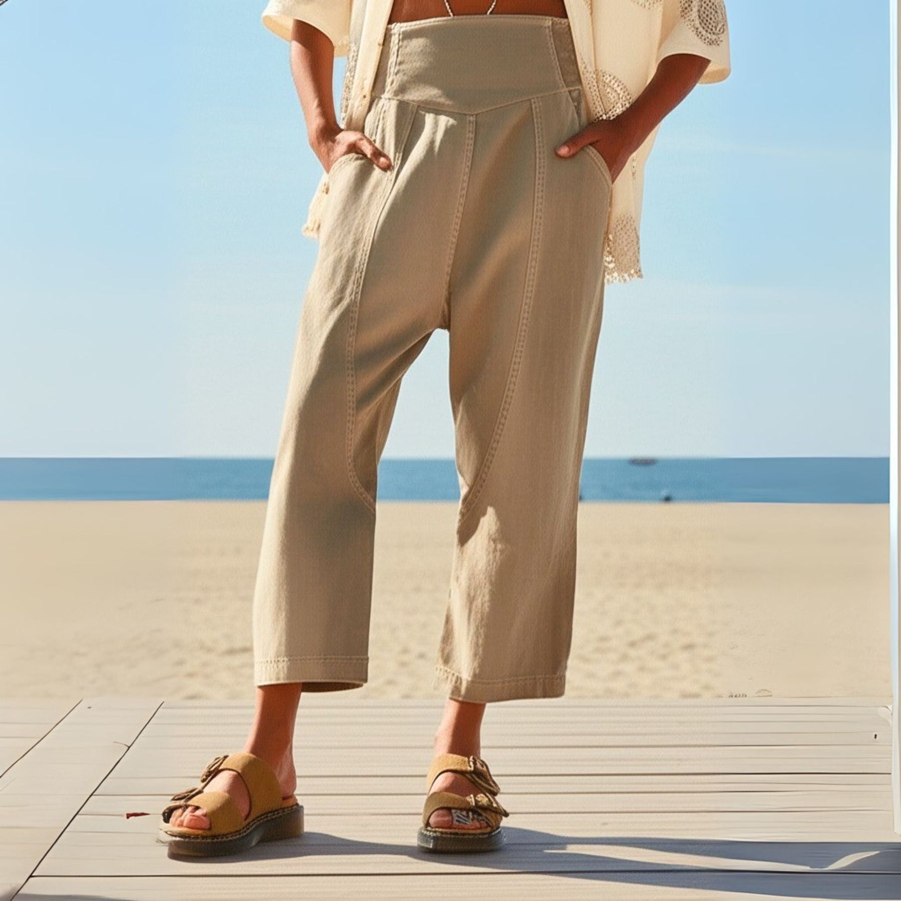 Women's pink harem-cut denim jeans with sculpted fit, featuring relaxed harem-style design and stylish details.