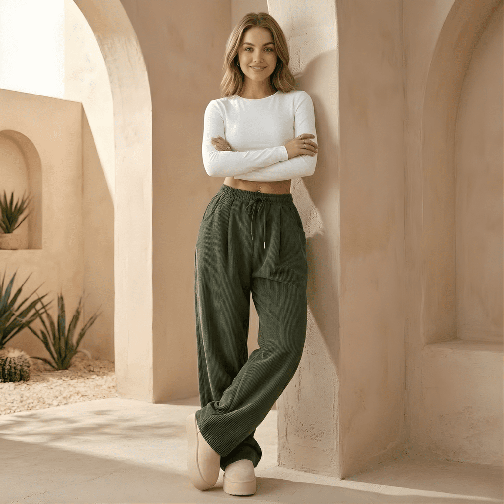Women's corduroy relaxed wide-leg trousers by Tammy Bradley, shown in a natural fit with a high waist and wide-leg silhouette.