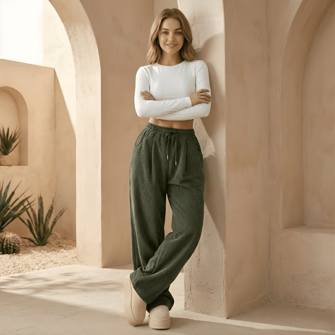 Women's corduroy relaxed wide-leg trousers by Tammy Bradley, shown in a natural fit with a high waist and wide-leg silhouette.