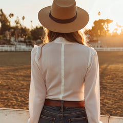 White lace Western button-down shirt for women, stylish blouse with intricate lace details and Western-inspired design.