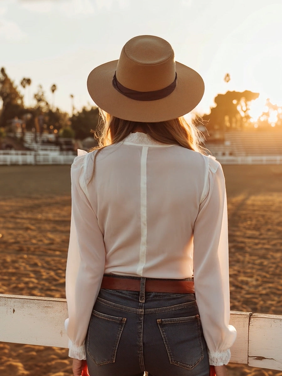 White lace Western button-down shirt for women, stylish blouse with intricate lace details and Western-inspired design.
