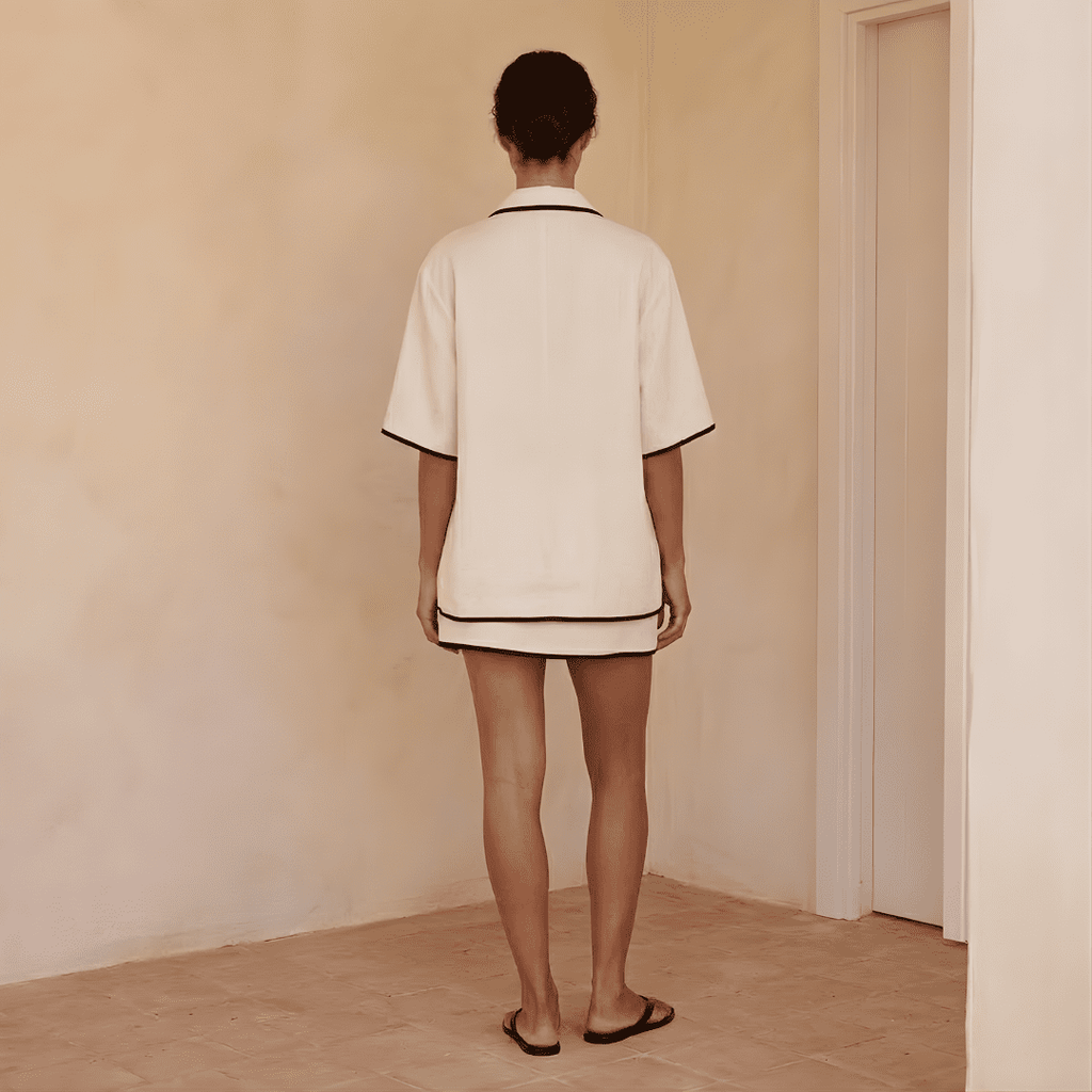 Ivory linen-blend women’s co-ord set including a shirt and skirt by Tammy Bradley, styled together in a casual, elegant look.