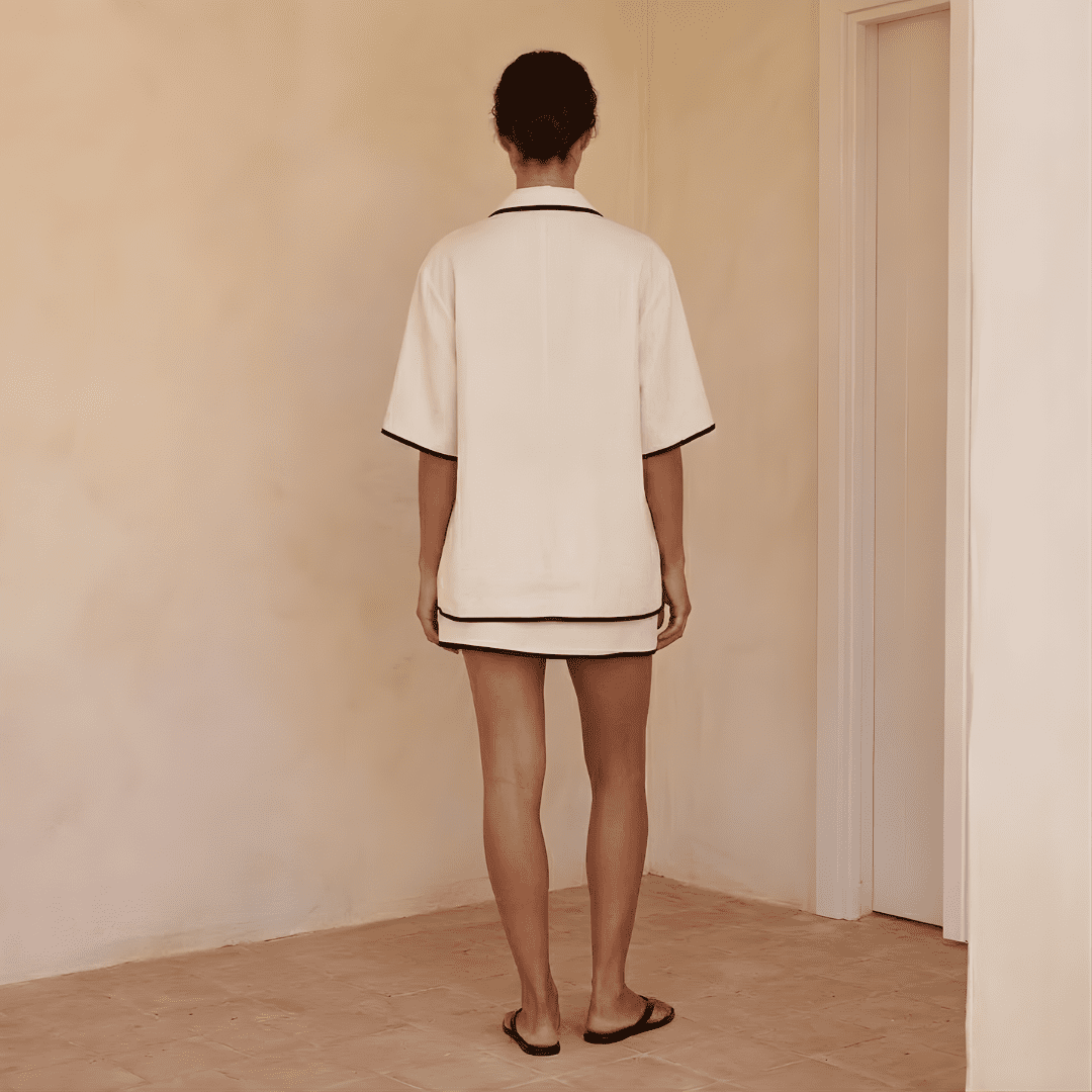Ivory linen-blend women’s co-ord set including a shirt and skirt by Tammy Bradley, styled together in a casual, elegant look.