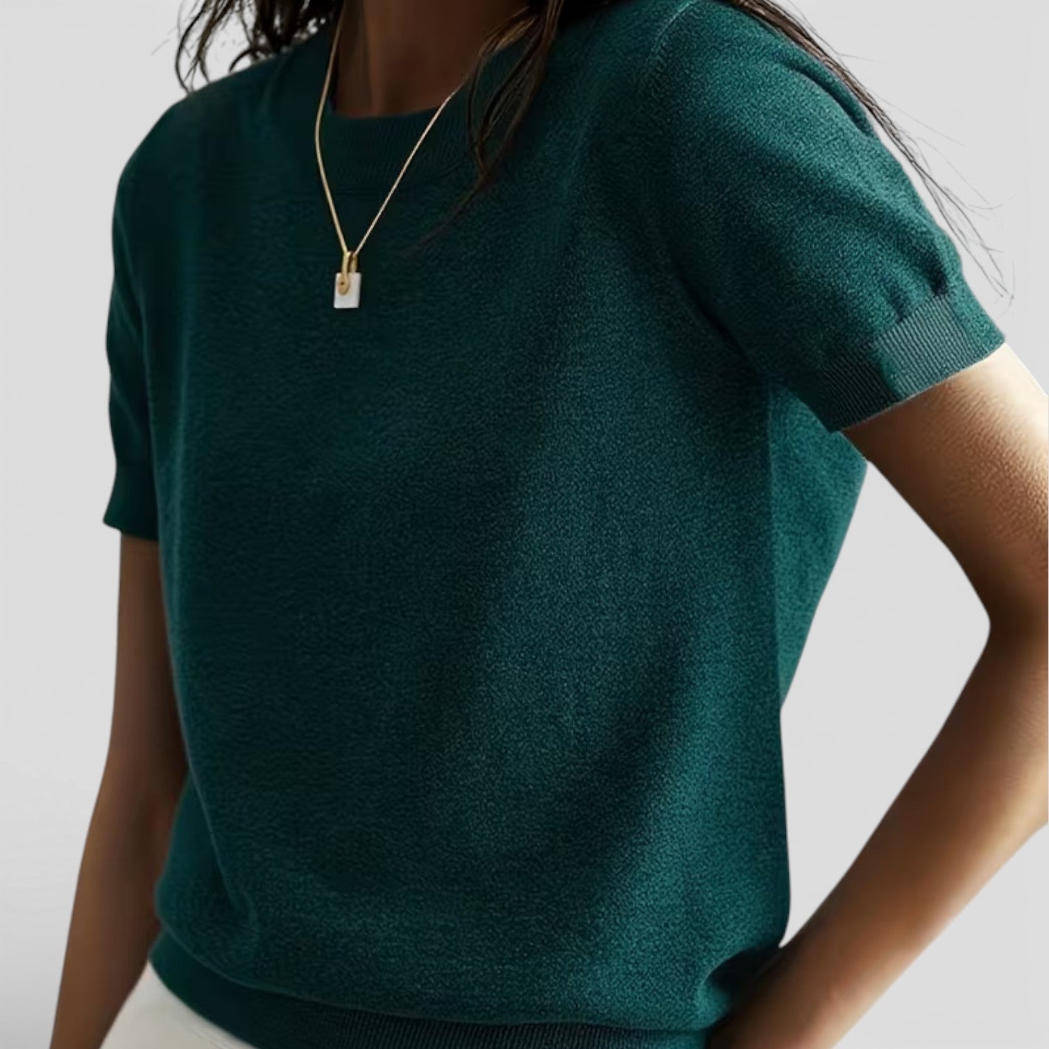 Women's knit wool blend top with classic fit, comfortable women's shirt in neutral color, ideal for casual wear.