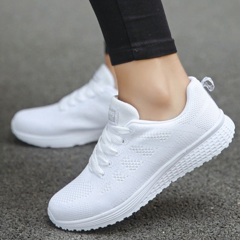 Lace-up knit orthopedic walking shoes for women with supportive design and breathable material, ideal for comfortable daily walking.