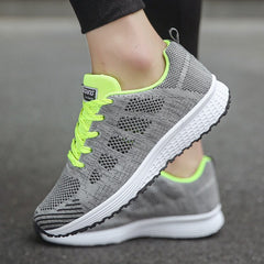 Comfortable women's orthopedic walking shoes with lace-up knit design, featuring supportive soles for all-day comfort.