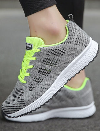Comfortable women's orthopedic walking shoes with lace-up knit design, featuring supportive soles for all-day comfort.