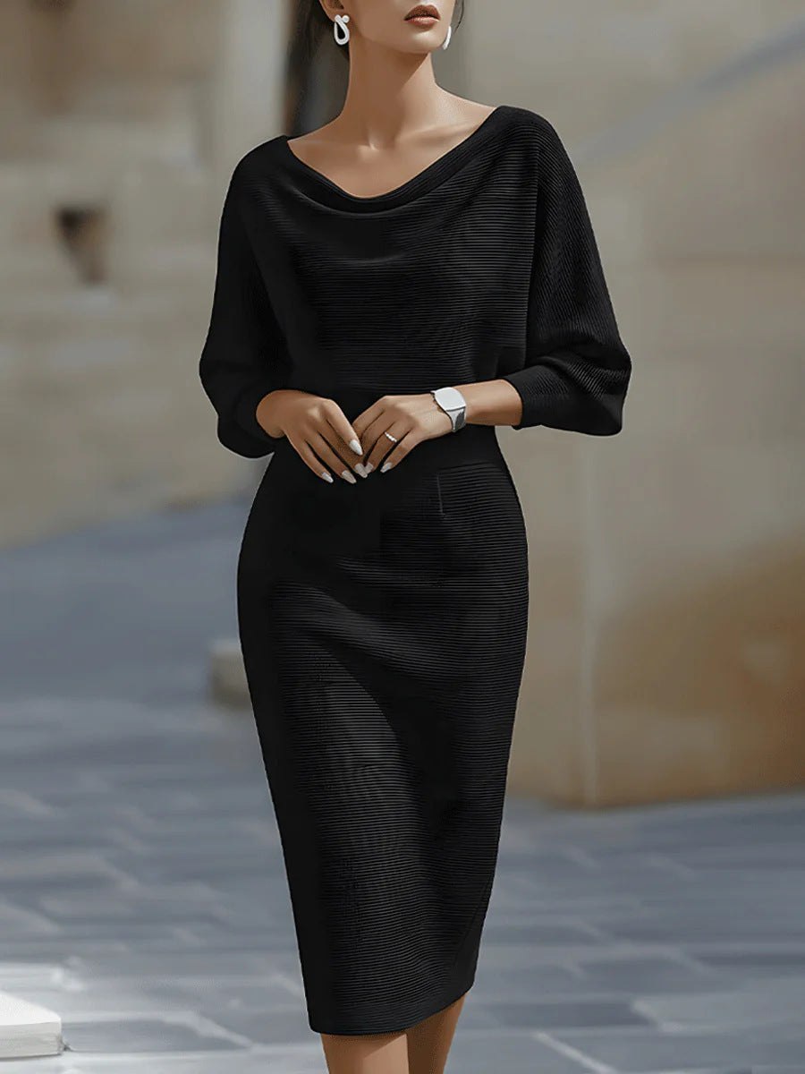 White batwing-sleeve waist-cinching dress for women by Tammy Bradley, stylish dress with flowy sleeves and fitted waist.