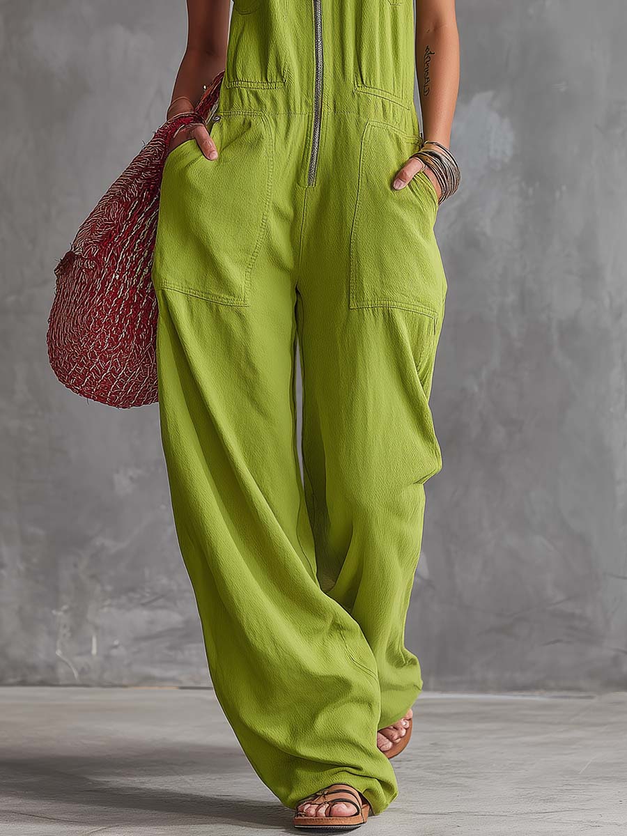 Bright green cotton linen women's jumpsuit with zip-front, featuring a stylish and comfortable design.