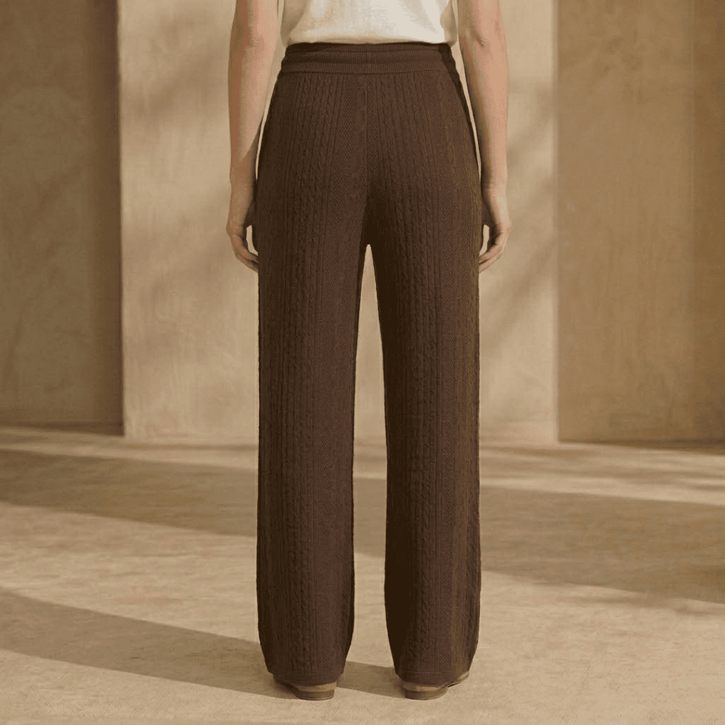Women's cable-knit wide-leg lounge trousers by Tammy Bradley, featuring cozy knit fabric and relaxed fit.