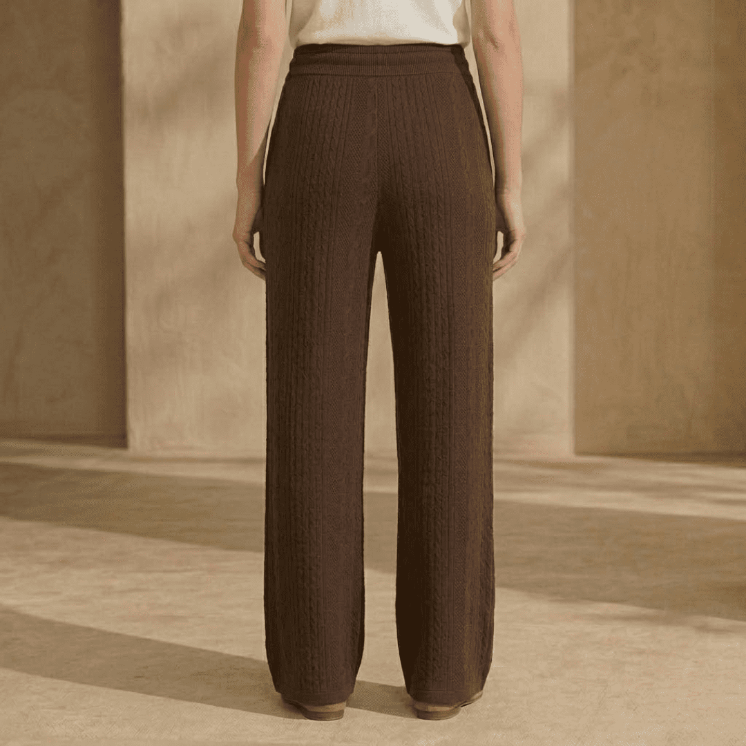 Women's cable-knit wide-leg lounge trousers by Tammy Bradley, featuring cozy knit fabric and relaxed fit.