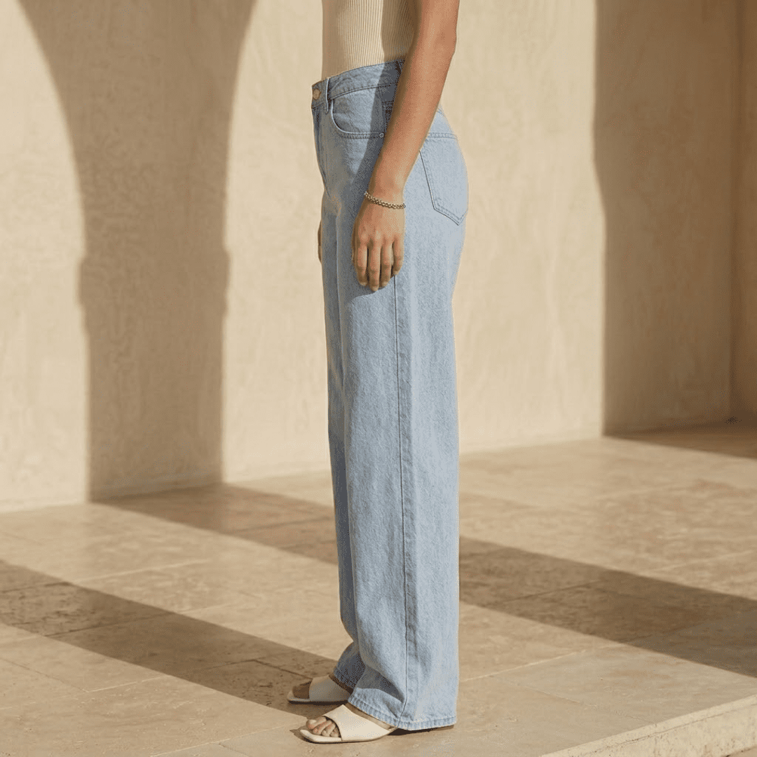 Women's high-waisted wide-leg denim jeans by Tammy Bradley, showcasing the relaxed fit and classic blue denim fabric.