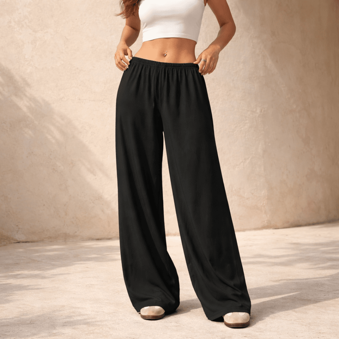 Women’s wide-leg drawstring lounge trousers by Tammy Bradley, featuring comfortable relaxed fit and casual style.