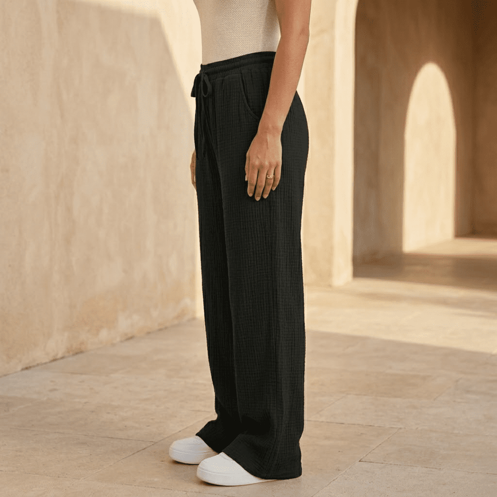 Women’s cotton wide-leg trousers by Tammy Bradley, featuring relaxed fit and comfortable, breathable fabric for casual wear.