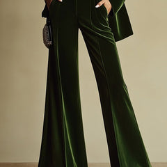 Emerald green loose velvet two-piece suit set for women, featuring stylish pants and a matching top, perfect for elegant occasions.