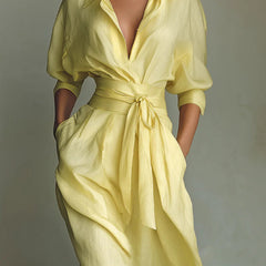 Solid color lapel long sleeve casual maxi dress with pockets and waist-cinching design, perfect for everyday wear.