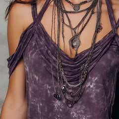 Purple boho tie-dye strappy cami top for women, short sleeve boho T-shirt with vibrant tie-dye pattern and adjustable straps.