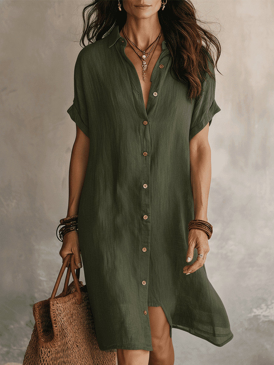 Black linen relaxed midi dress for women by Tammy Bradley, featuring a flowy silhouette and casual elegance.