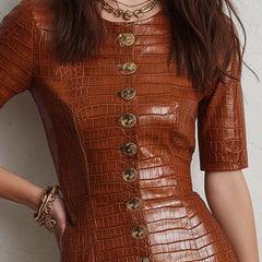 Caramel croc-embossed faux leather midi dress with long sleeves and fitted silhouette, stylish and modern for fashionable occasions.