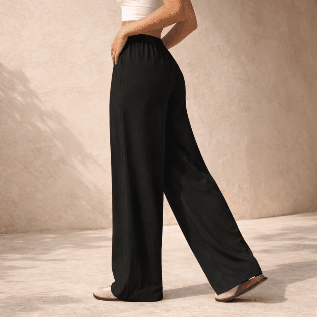 Women's wide-leg drawstring lounge trousers by Tammy Bradley, showing soft fabric and relaxed fit with adjustable waist.