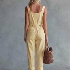 Light yellow denim women's jumpsuit with square neck and zip-front, featuring pants style and stylish design.