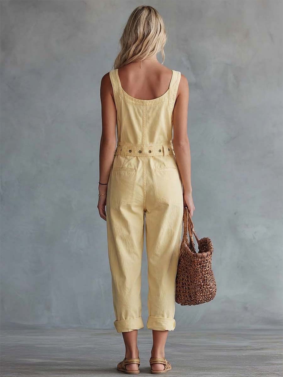 Light yellow denim women's jumpsuit with square neck and zip-front, featuring pants style and stylish design.