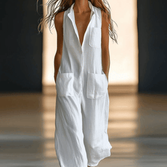 White linen sleeveless wide-leg jumpsuit for women, featuring a relaxed fit and stylish design, ideal for warm weather.