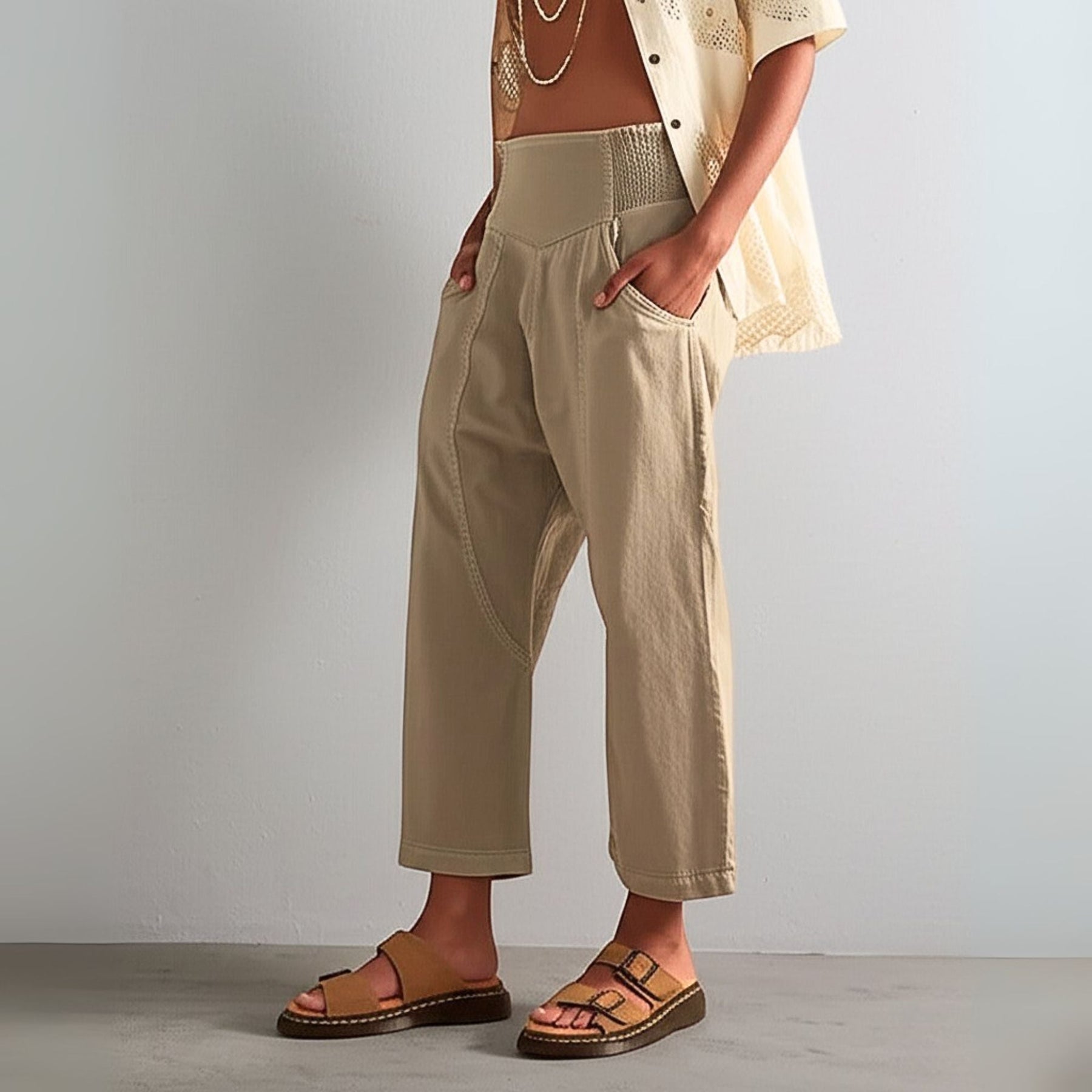 Loose harem-cut wide-leg denim trousers for women, pull-on style, casual denim pants with relaxed fit and comfortable design.