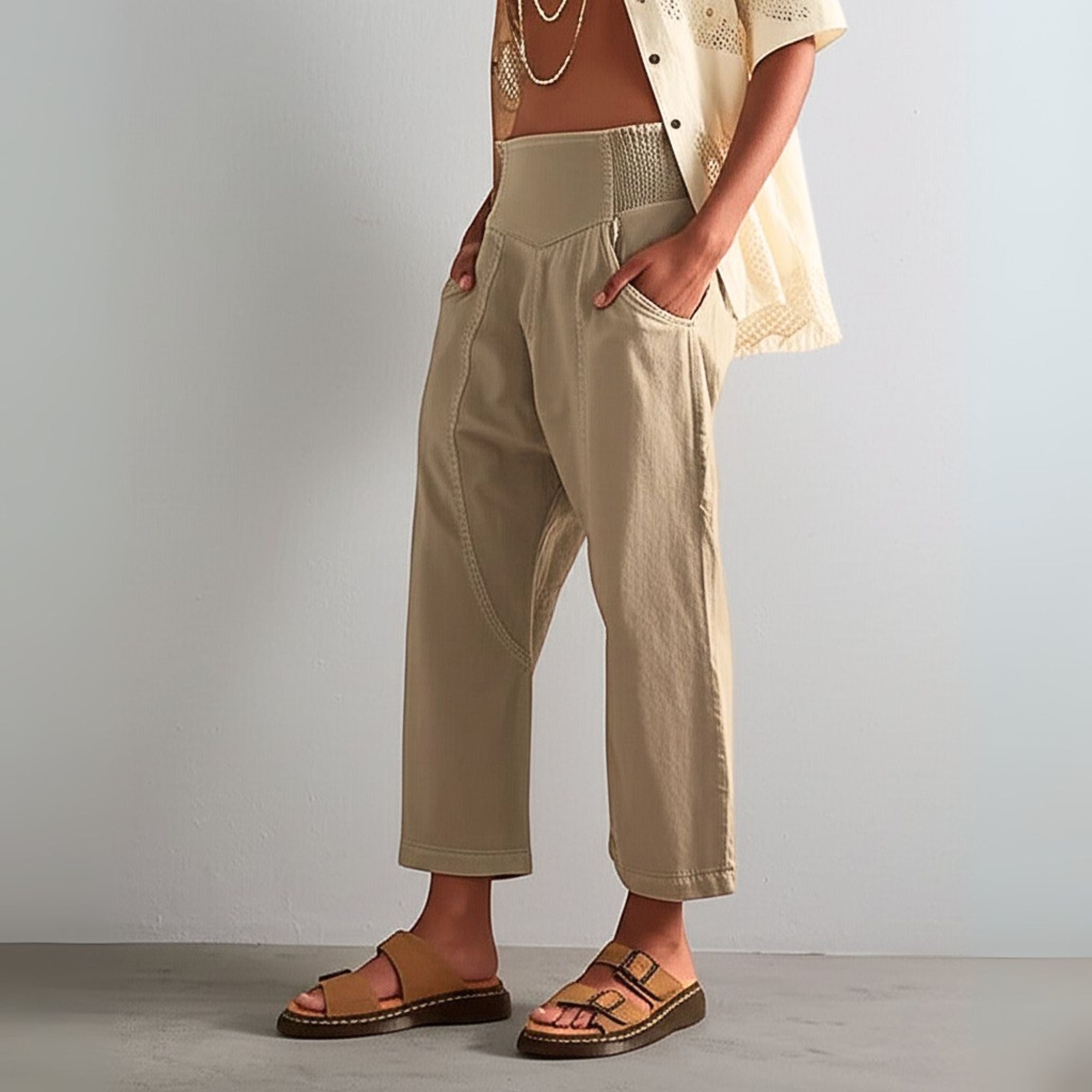 Loose harem-cut wide-leg denim trousers for women, pull-on style, casual denim pants with relaxed fit and comfortable design.