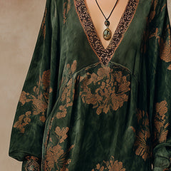Green faux suede tassel maxi dress for women featuring a flowy silhouette and tassel details, perfect for elegant occasions.