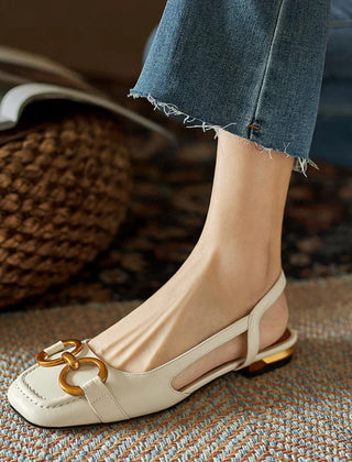 Women's orthopedic sandals with adjustable buckle straps and arch support, featuring comfortable footbed and supportive design.