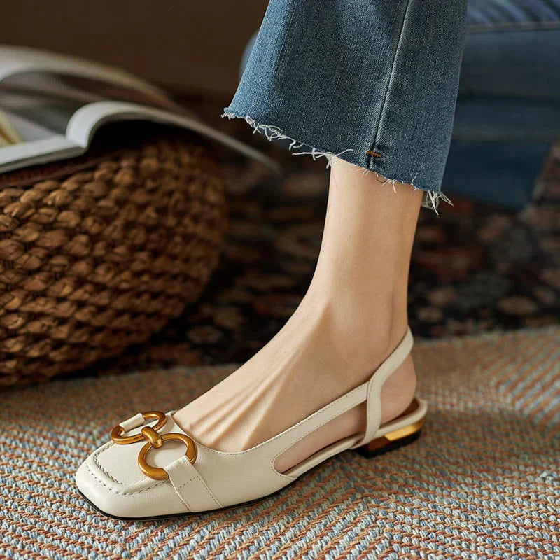 Women's orthopedic sandals with adjustable buckle straps and arch support, featuring comfortable footbed and supportive design.