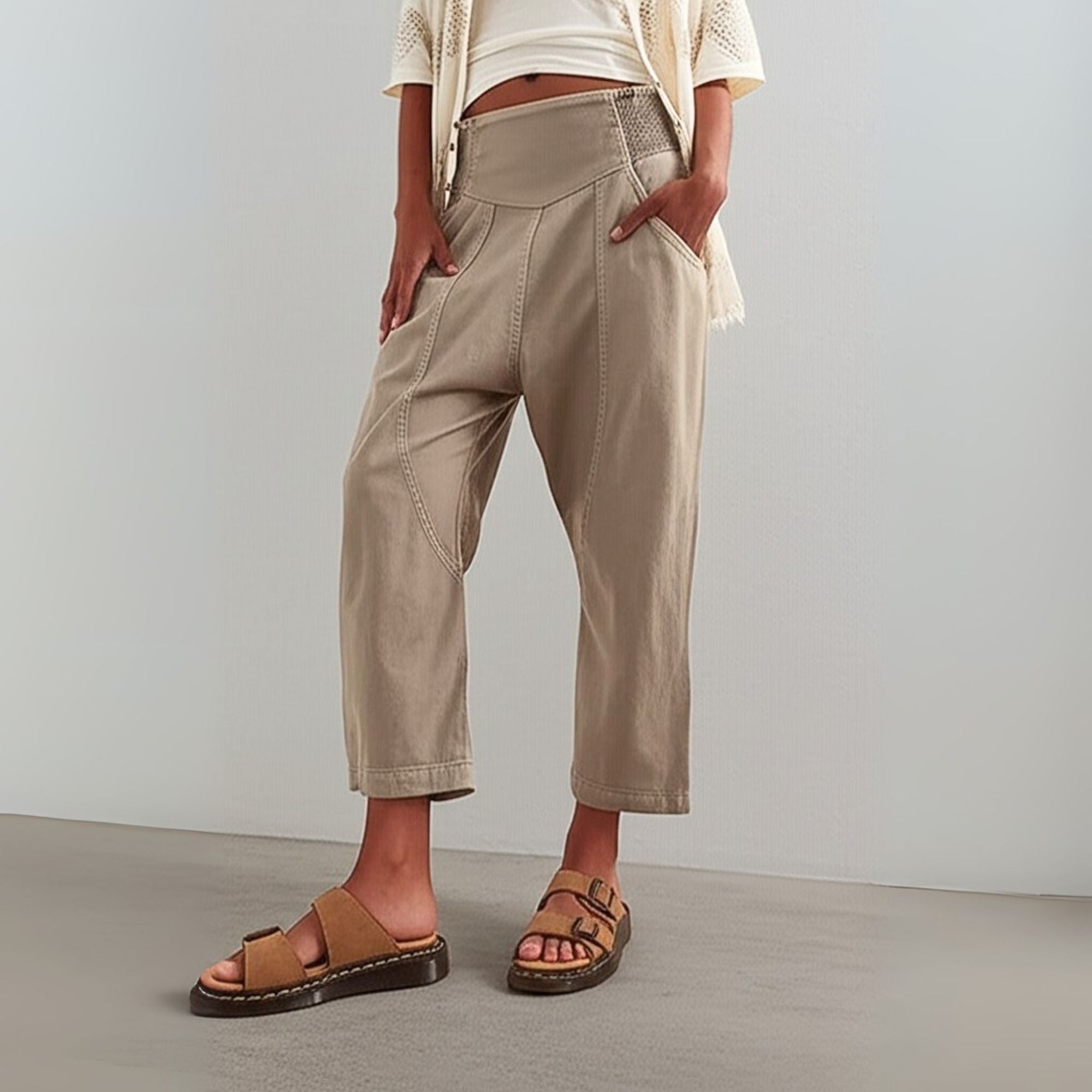 Women’s wide-leg denim trousers with harem-cut style, loose pull-on design, in light blue denim for a relaxed fit.